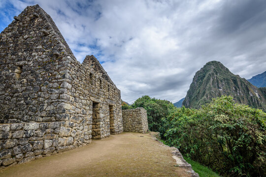 Fototapeta The path to Machu Picchu, the high mountain capital of the Inca tribe, a 15th century citadel site, buildings and view of the plateau and Andes mountains.
