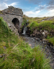 Westcoast Ireland. Conemara. Peat and heather fields. Foggy. Stone bridge and small stream.