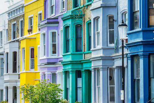 Colorful victorian houses facades in Notting Hill, architecture background, London, UK