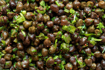 Green Chickpea Chaat or Harbara Chat meal background texture. Popular snack from India.
