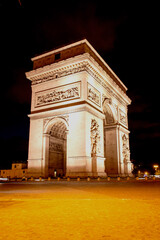 Fototapeta na wymiar The Arc de Triomphe is one of the most famous monuments in Paris and the second largest triumphal arch in the world. It is located at the end of the Champs-Elysées 