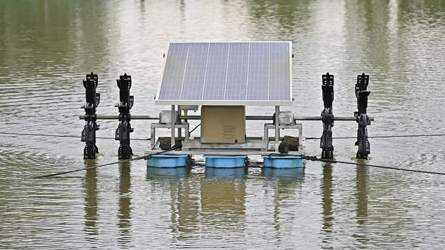 A water turbine with solar panel for water treatment and increasing oxygen for fish farm.