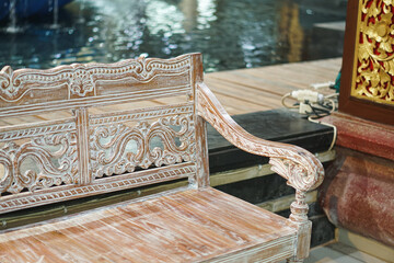 Classical wooden vintage chair at art center building in Denpasar Bali