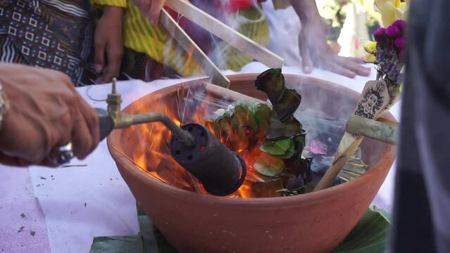 Ngaben or cremation ceremony in Bali, Indonesia. It is performed to release the soul of a dead person. The stage of burning the soul in the Ngaben tradition.
