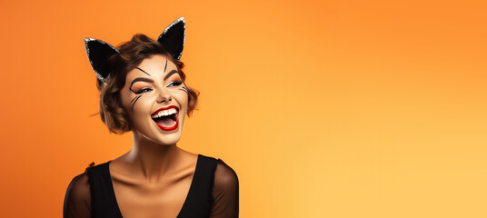Woman Dressed as a Sexy Cat for Halloween on an Orange Banner with Space for Copy