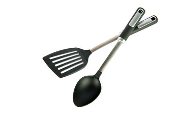 Kitchen spatula and spoon isolated on white .