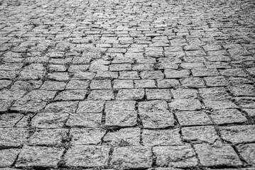 Paving stone texture. The texture of the paved tiles at the bottom of the street. Concrete paving...