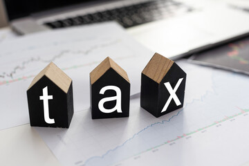 inflation concept, red graph arrow, Percent sign on a wooden cube with row of coins in idea for FED consider interest rate hike, world economics, and inflation control, US dollar inflation.