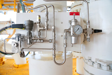 	
Close up of controller unit or control process of oil and gas process on the platform. The controller for control any equipment of oil and gas process by technician or control room.
