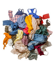 Isolated pile of used clothes on a light background. Second hand for recycling