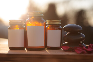 Set of three bottles, pill containers. Natural healing supplements, composition. Empty label.