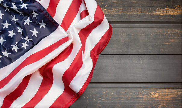 folded USA or american flag on a wooden background