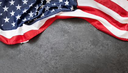 Obraz premium patriotic background USA or american flag folden on a stone background