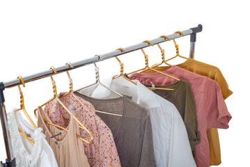 Second-hand clothes on the rail on a light background. The concept of sustainable economic life.  - 617454712