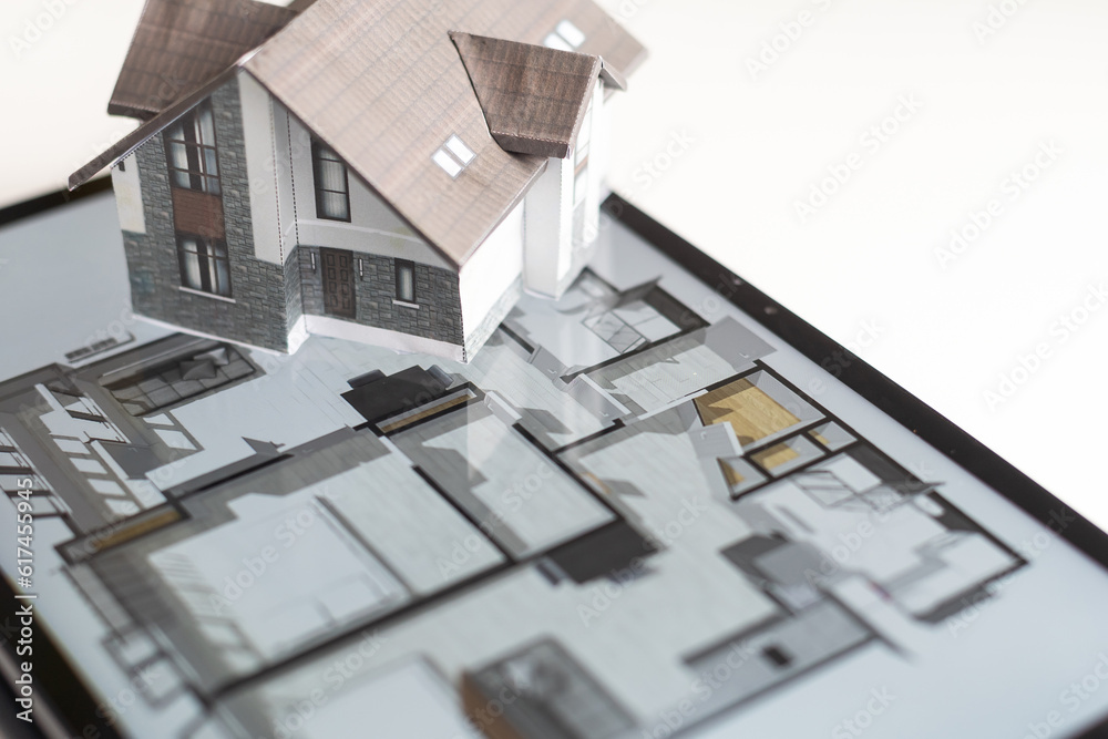 Poster small house model is on screen tablet and icons home electronics devices connecting with wireless. s