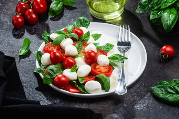 Caprese salad with tomato, mozzarella and basil