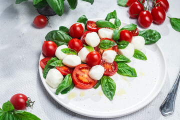 Caprese salad with tomato, mozzarella and basil