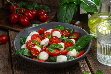 Caprese salad with tomato, mozzarella and basil