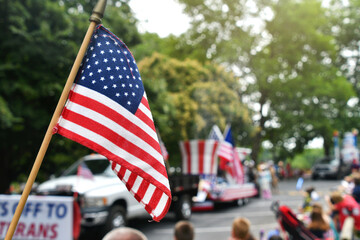 Waving an American flag at the Independence Day Parade on the 4th of July