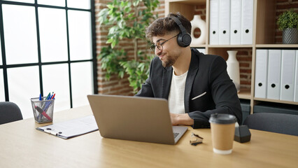 Young arab man business worker having video call working at office