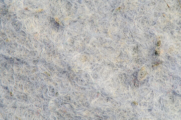 Fabric fibers of a dirty used rag. Highly detailed seamless texture of fabric fibers.