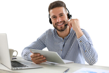 Cheerful young support phone male operator in headset, at workplace while using digital tablet on a...