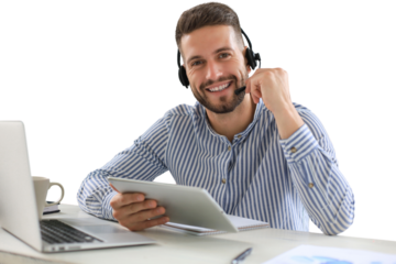 Cheerful young support phone male operator in headset, at workplace while using digital tablet on a transparent background