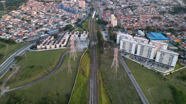Aerial view of the region of Interlagos and Cidade Dutra in S&atilde;o Paulo. Houses, buildings and car traffic during late afternoon in 2023.