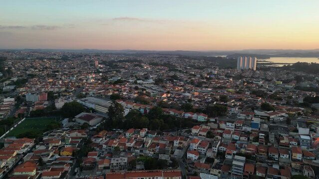 Aerial view of the region of Interlagos and Cidade Dutra in S&atilde;o Paulo. Houses, buildings and car traffic during late afternoon in 2023.