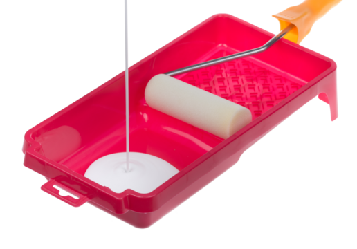 White paint pouring into a red plastic paint tray with white roller for painting walls, furniture or art, png clipart isolated cut out on transparent background