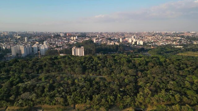 Aerial view of the region of Interlagos and Cidade Dutra in S&atilde;o Paulo. Houses, buildings and car traffic during late afternoon in 2023.