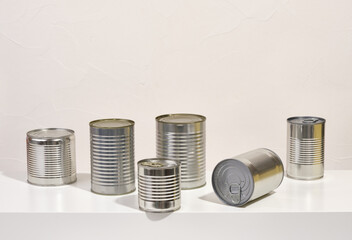 Canned meat, vegetables, beans, fish and fruits. Concept of food stocks.