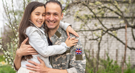 Happy reunion of british soldier and his little daughter.