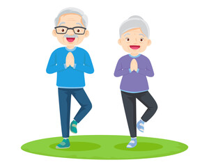 Elderly couple practicing yoga. Active Grandparents doing exercises