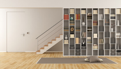 Modern Living room with bookcase ,staircase and closed door - 3d rendering