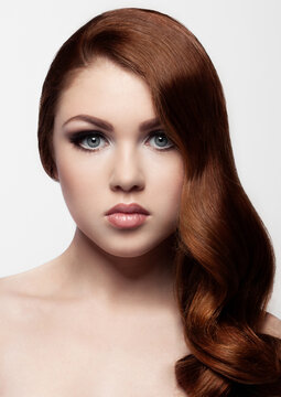 Ginger red long hair.Fashion portrait red lips on white background
