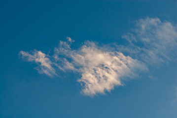 clouds  at sunset clear blue sky