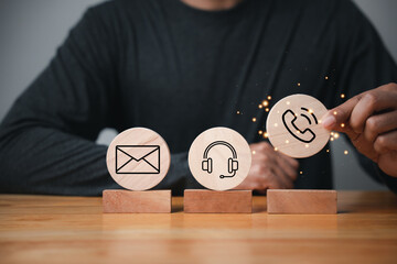 Website page contact us or e-mail marketing concept. Customer support hotline and people...