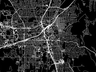 Vector road map of the city of  Huntsville Alabama in the United States of America with white roads on a black background.