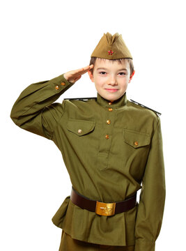 Portrait of young boy in Soviet military uniform isolated on white background