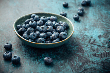 Fototapeta na wymiar Blueberry - antioxidant organic superfood in a bowl concept for healthy eating and nutrition