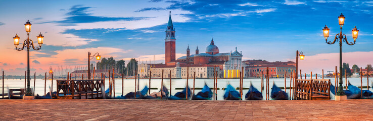 Fototapeta na wymiar Panoramic image of Venice, Italy during sunrise.