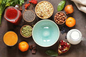 Fototapeta na wymiar Still life super food - smoothies, muesli, nuts, berries, chia seeds