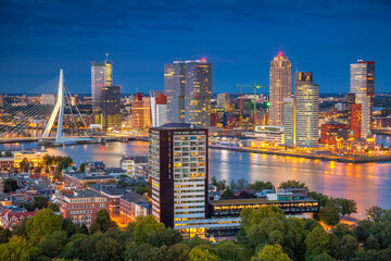 Cityscape image of Rotterdam, Netherlands during twilight blue hour.