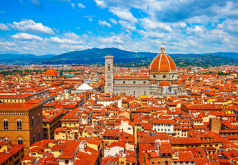 Fototapeta na wymiar Cathedral Santa Maria del Fiore in Florence, view to old town with red tegular roofs