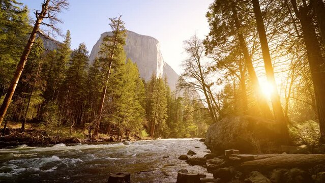 The Merced River as it runs through Yosemite National Park in California. El Capitan can be seen in the background.