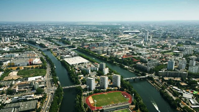 Aerial view of Saint-Denis involving the Seine River and famous Stade de France stadium to the north of Paris, France