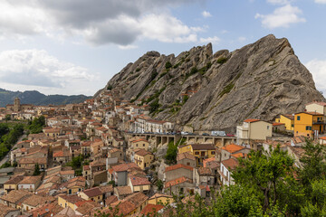 Obraz premium View of Pietrapertosa and Castelmezzano. Two beautiful villages built on the Lucanian Dolomites in Italy. Connected by a zipline that crosses the valley adrenaline-pumping experience. Day and sunset.