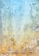Grunge background with texture of stucco blue and ochre color