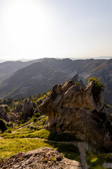 View of Pietrapertosa and Castelmezzano. Two beautiful villages built on the Lucanian Dolomites in Italy. Connected by a zipline that crosses the valley adrenaline-pumping experience. Day and sunset.